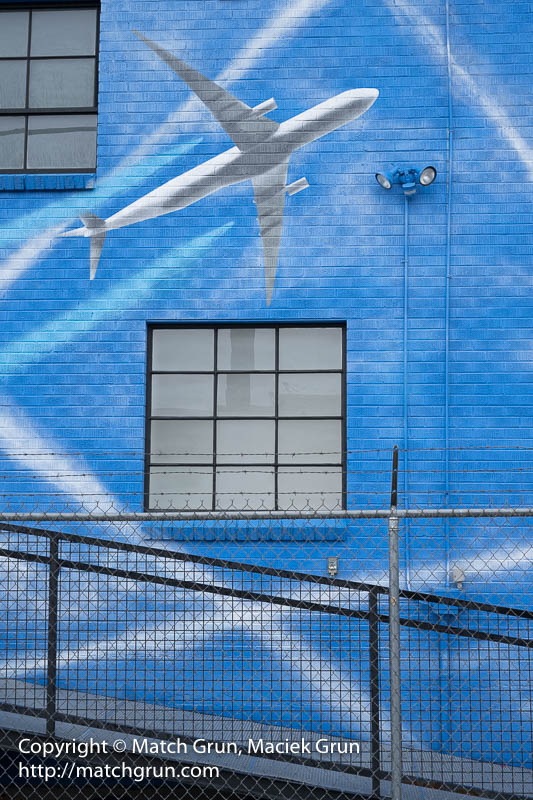 2312-0090-Blue-Wall-And-Airplane-In-The-Sky